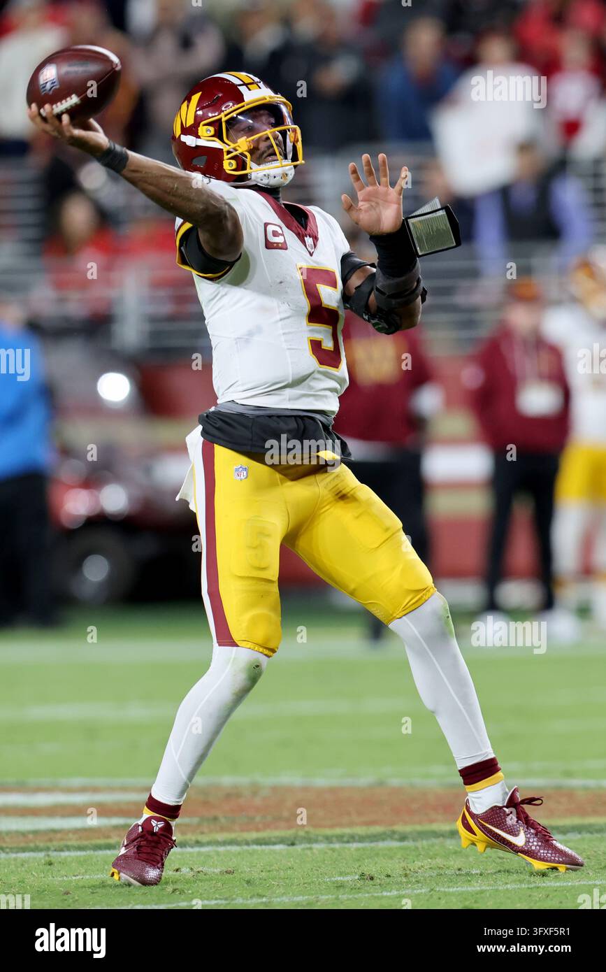 Washington Commanders quarterback Jayden Daniels (5) throws during an ...