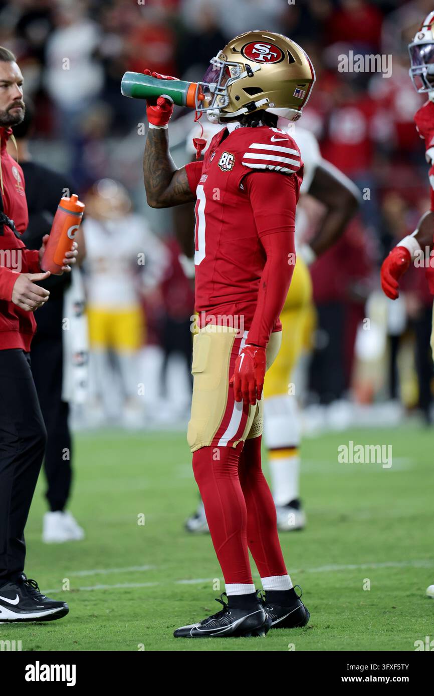 Washington Commanders New Roster San Francisco 49ers cornerback Renardo Green (0) drinks from a Gatorade ...