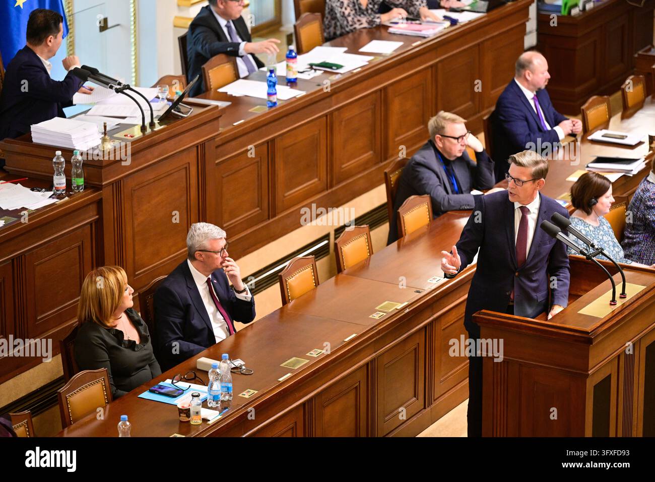 ODS Chairman Martin Kupka, at the lectern, speaks at the Chamber of ...