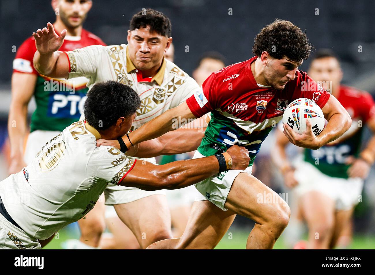Alex Conti of Lebanon is tackled during the Men's Rugby League World ...