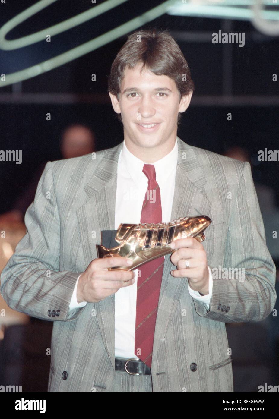 England's Gary Lineker shows the World Cup Soccer Golden Shoe award he ...