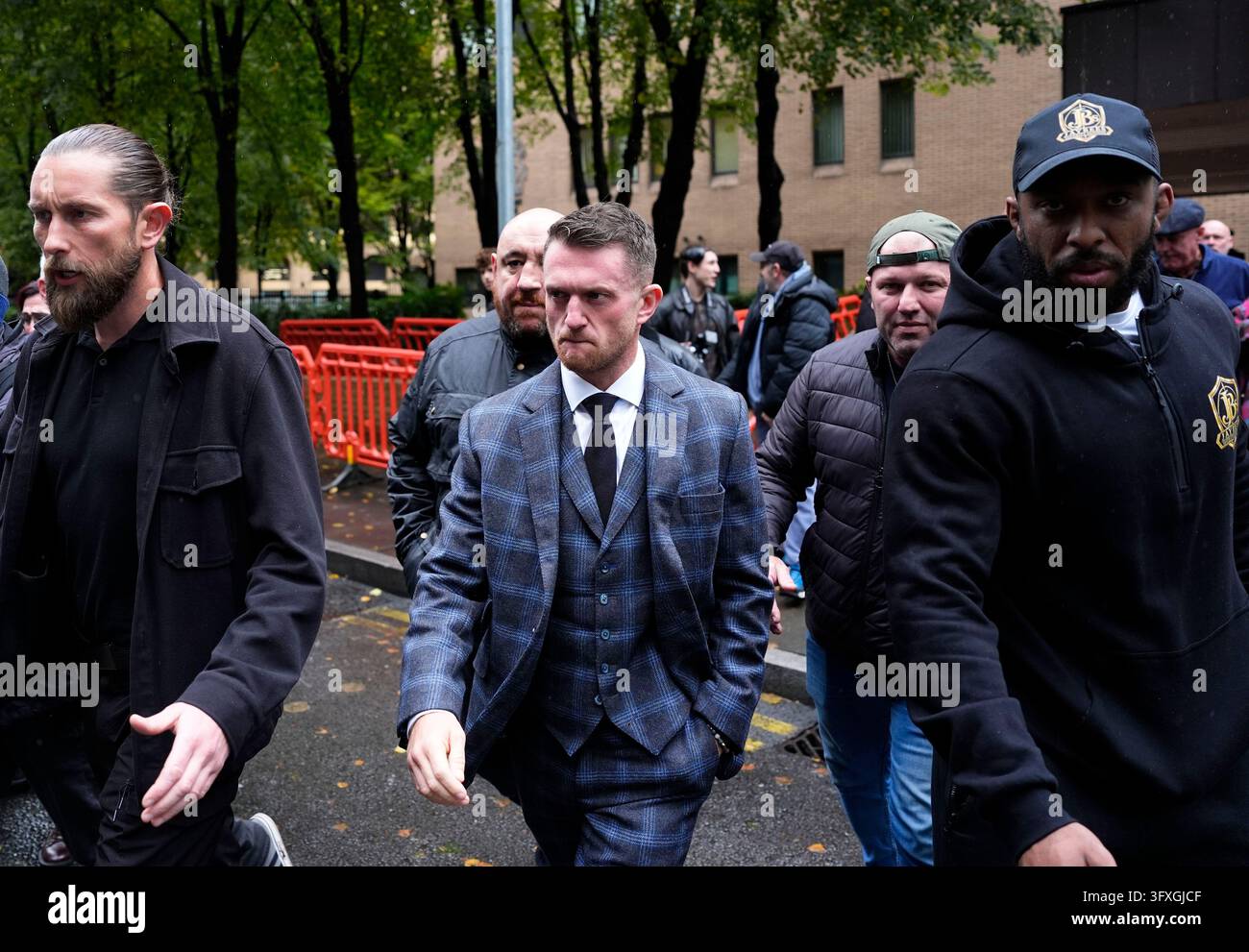 Tommy Robinson, whose real name is Stephen Yaxley-Lennon, (centre ...