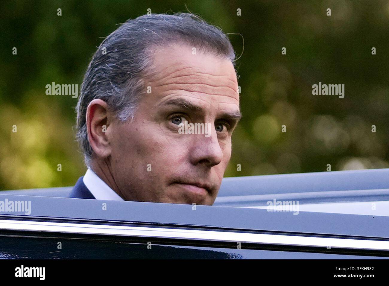 FILE - Hunter Biden steps into a vehicle as he leaves federal court ...