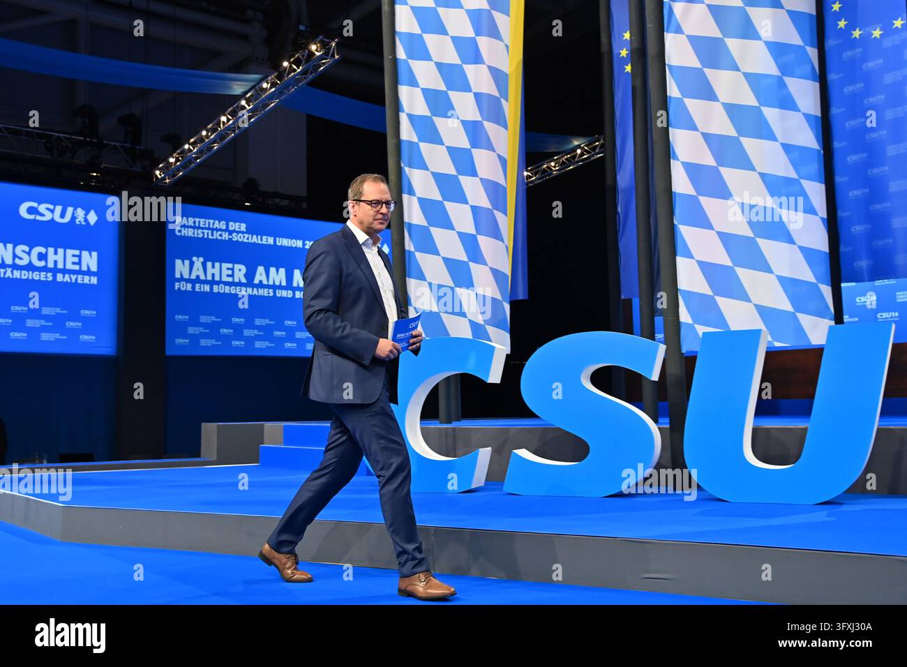 Martin HUBER (Secretary General of the CSU) steps onto the podium in ...