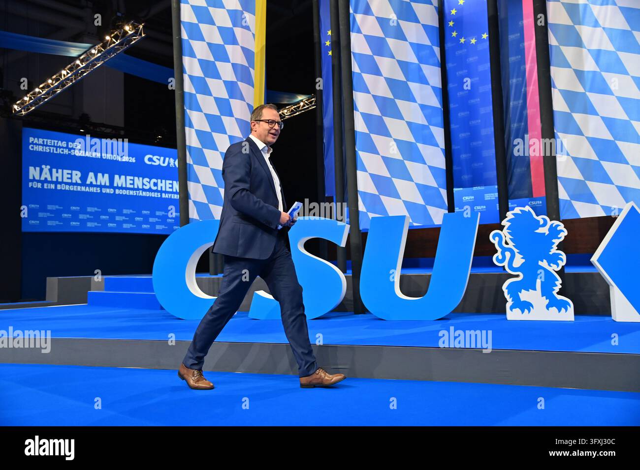 Martin HUBER (Secretary General of the CSU) steps onto the stage in ...