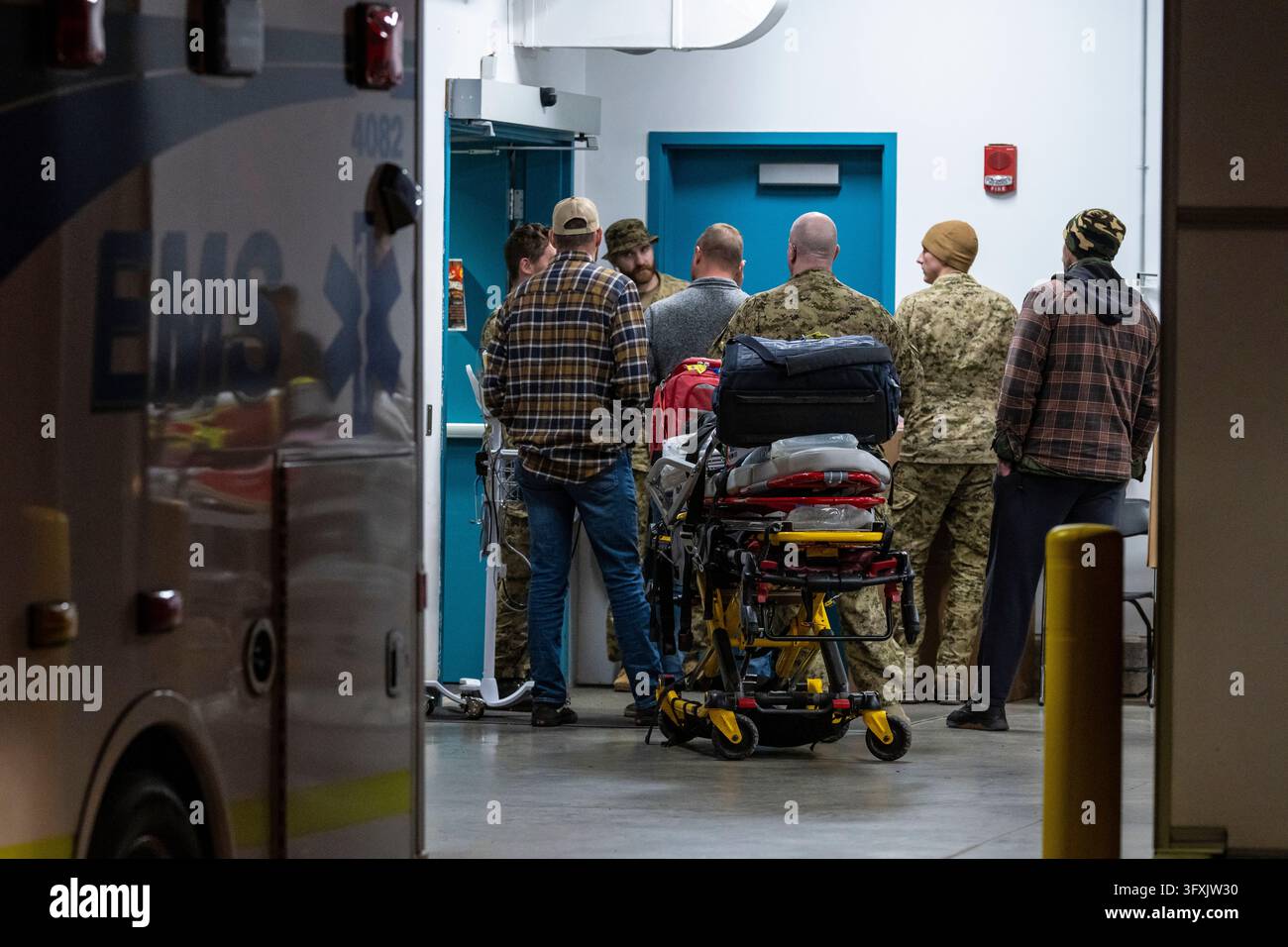Emergency crews and military personnel at the Wainwright Health Centre ...