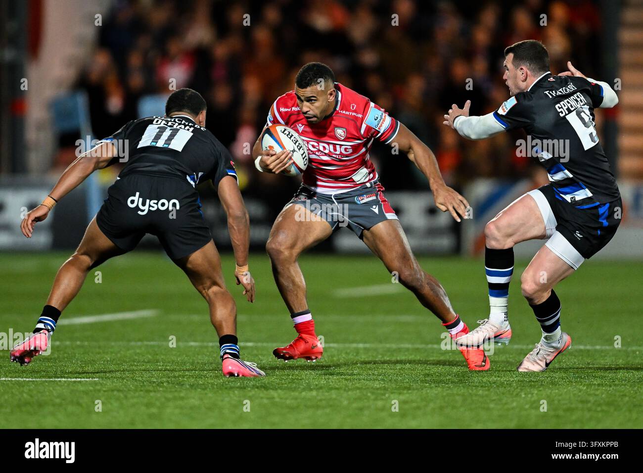 Will Joseph of Gloucester Rugby side steps Tyler Offiah of Bath Rugby ...