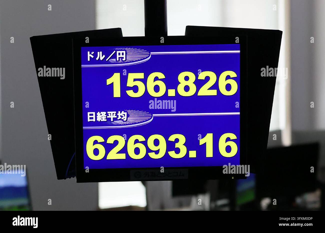 Sign Board Normal Size An electronic board displays the current exchange rate of the Japanese ...