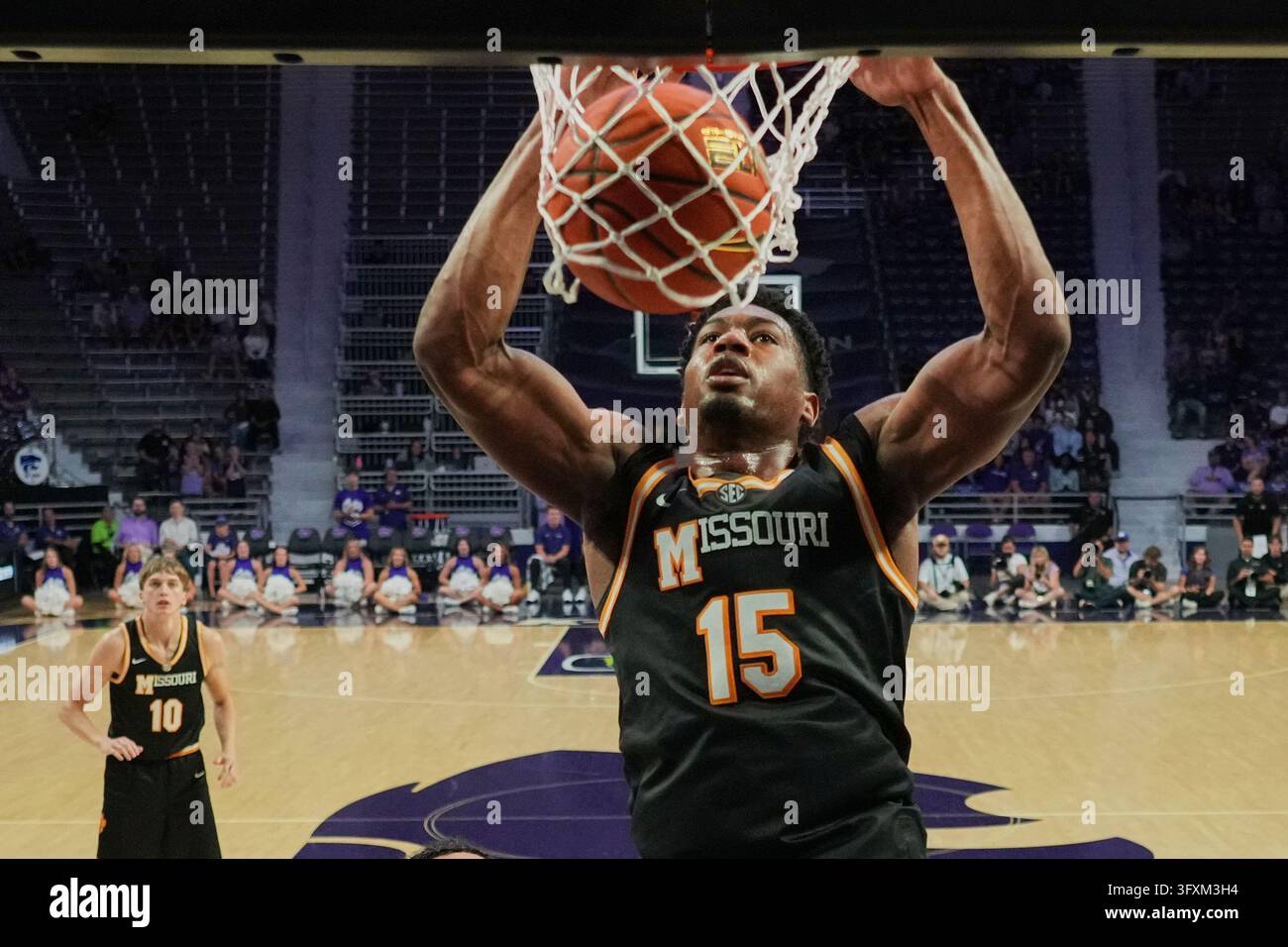 Kansas Dunks Missouri's Bryson Tiller dunks the ball during the first half of an ...