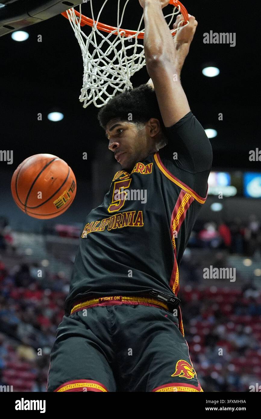 Jacobs Vector USC forward Jacob Cofie dunks during the first half of an NCAA college ...