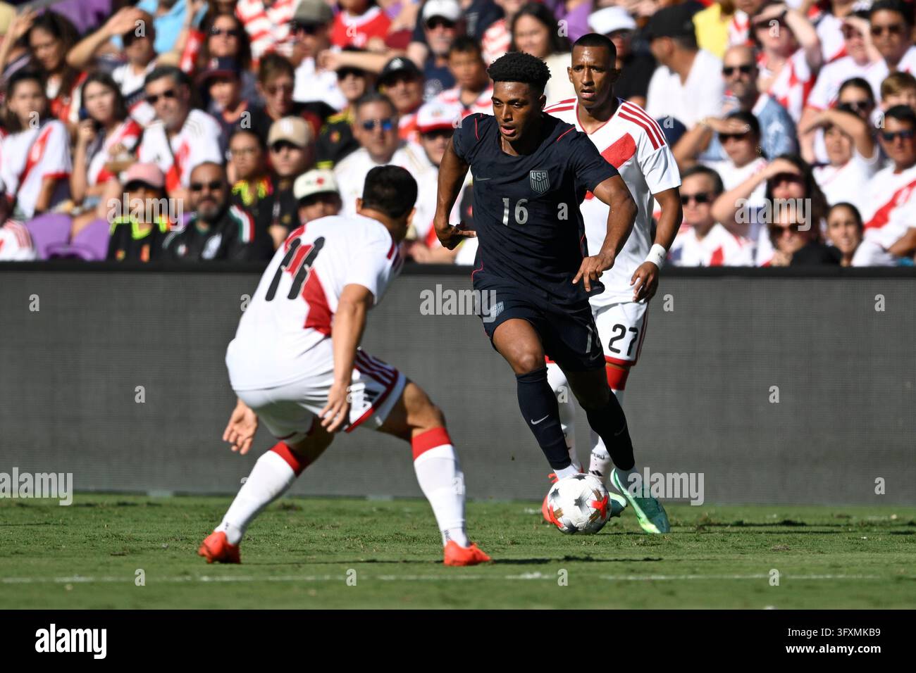 United States' Alex Freeman (16) controls the ball during the first ...