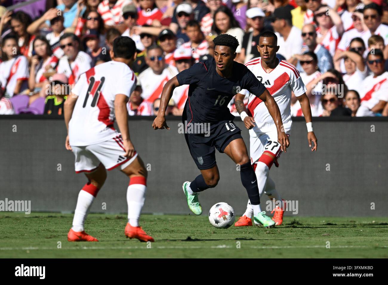 United States' Alex Freeman (16) controls the ball during the first ...
