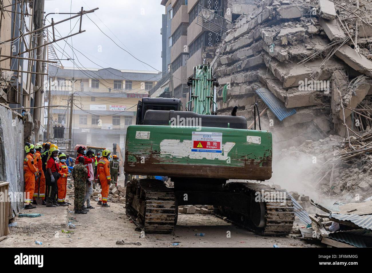 Construction Emergency Rescue Emergency teams conduct search and rescue operations at the site of a ...