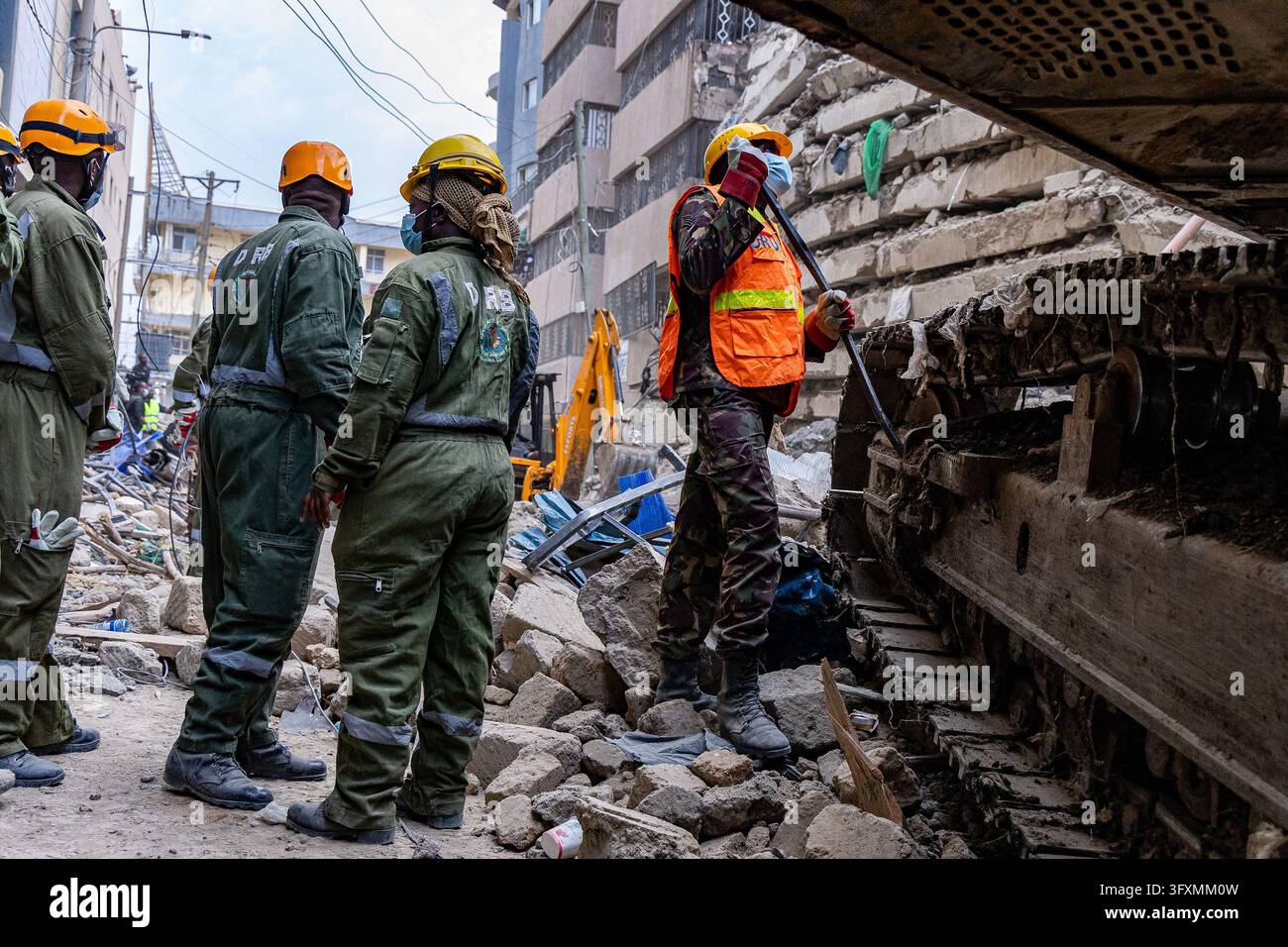Construction Emergency Rescue Emergency teams conduct search and rescue operations at the site of a ...
