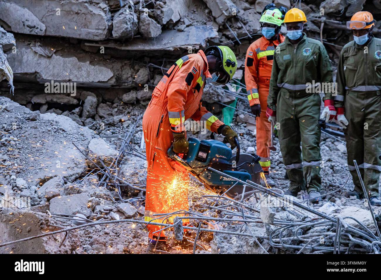 Construction Emergency Rescue Emergency teams conduct search and rescue operations at the site of a ...