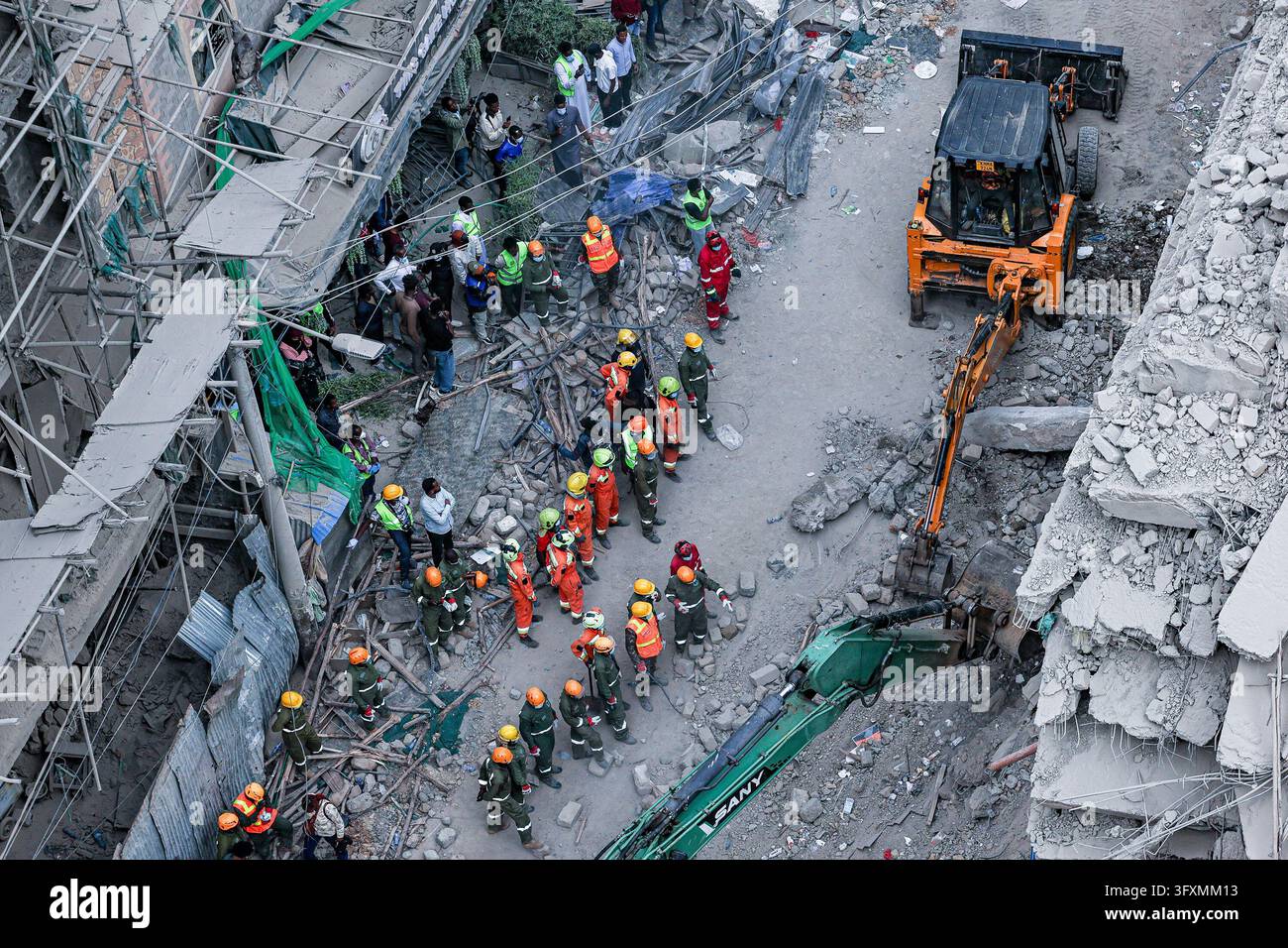 Construction Emergency Rescue Emergency teams conduct search and rescue operations at the site of a ...