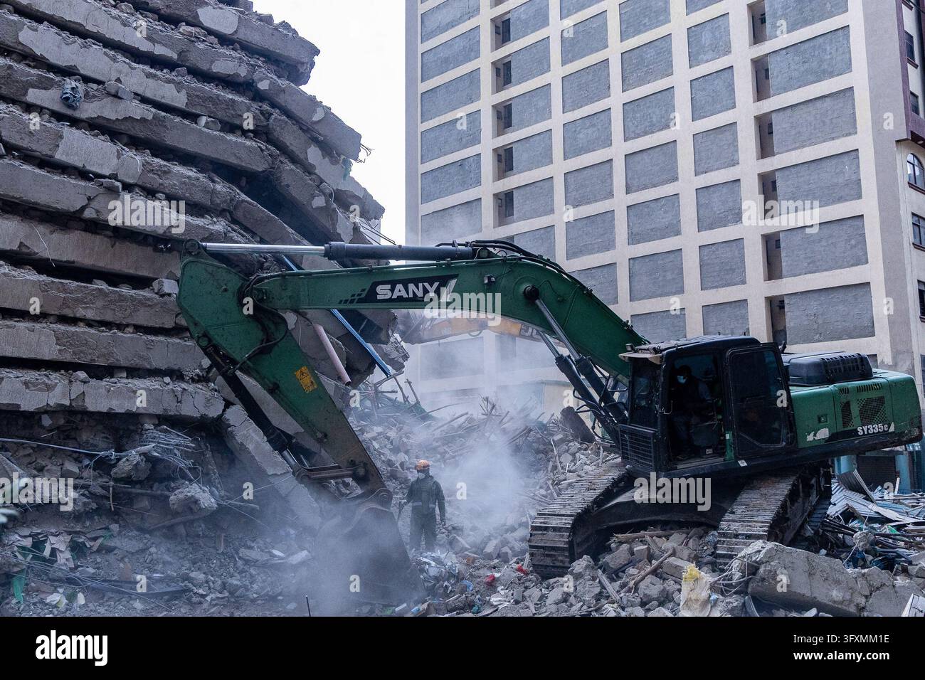 Construction Emergency Rescue Emergency teams conduct search and rescue operations at the site of a ...