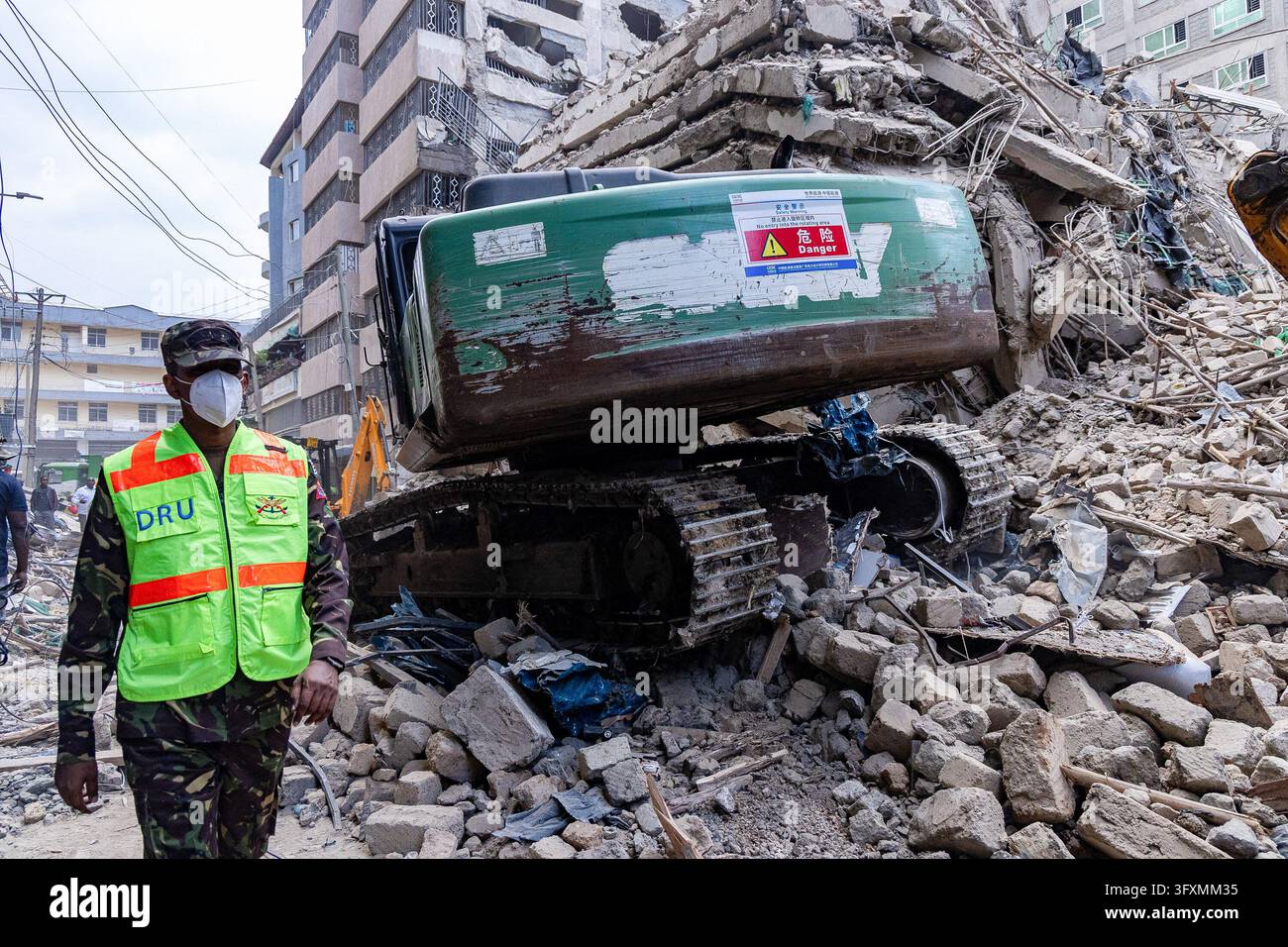 Construction Emergency Rescue Emergency teams conduct search and rescue operations at the site of a ...