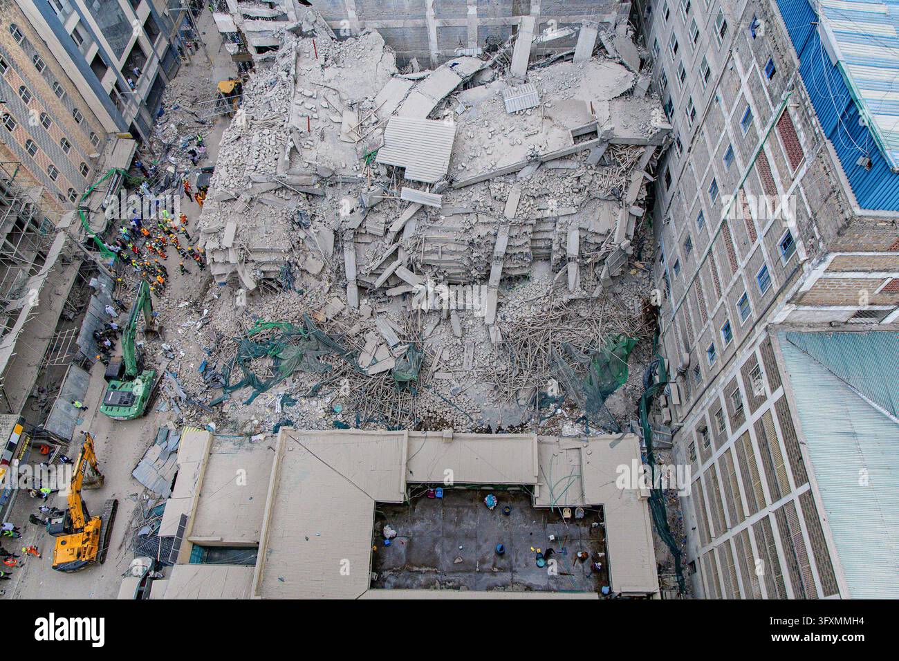 Construction Emergency Rescue Emergency teams conduct search and rescue operations at the site of a ...