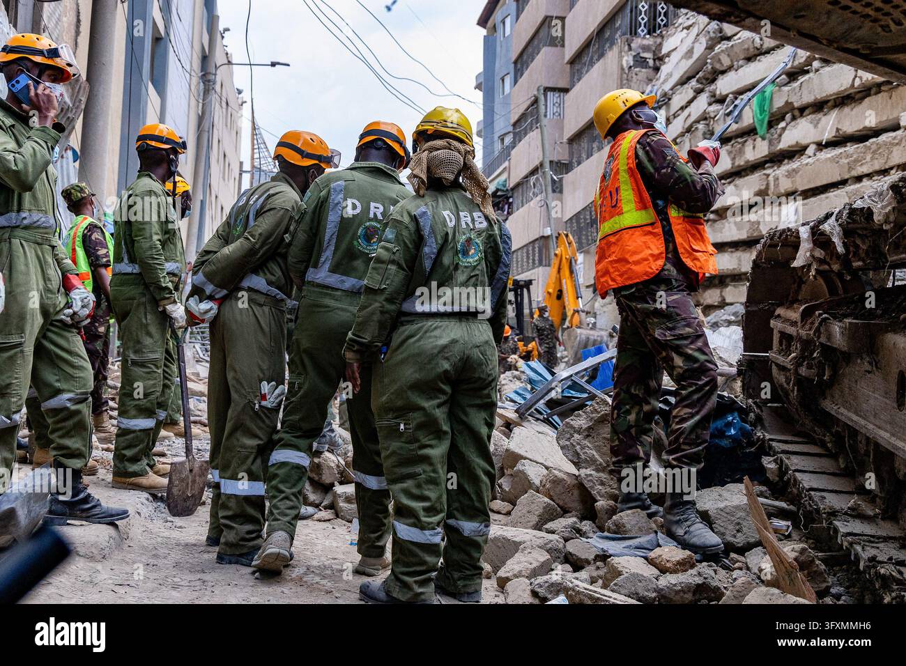 Construction Emergency Rescue Emergency teams conduct search and rescue operations at the site of a ...