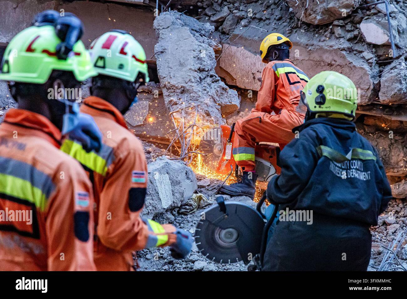 Construction Emergency Rescue Emergency teams conduct search and rescue operations at the site of a ...