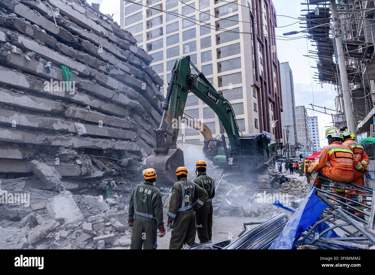Construction Emergency Rescue Emergency teams conduct search and rescue operations at the site of a ...