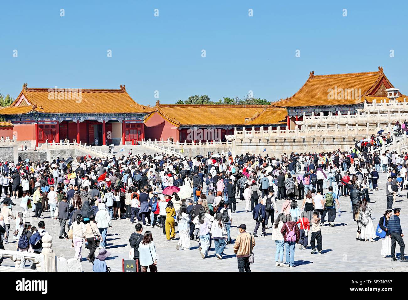 Visitors throng the Palace Museum in Beijing on October 6, 2026, as the ...