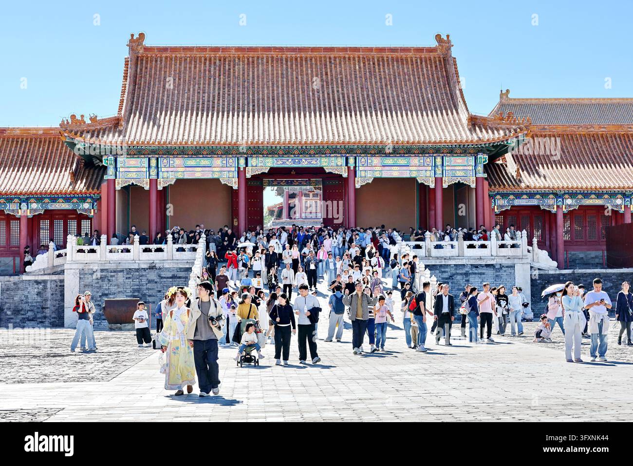 Tourists visit the Palace Museum in Beijing on October 6, 2026, as the ...