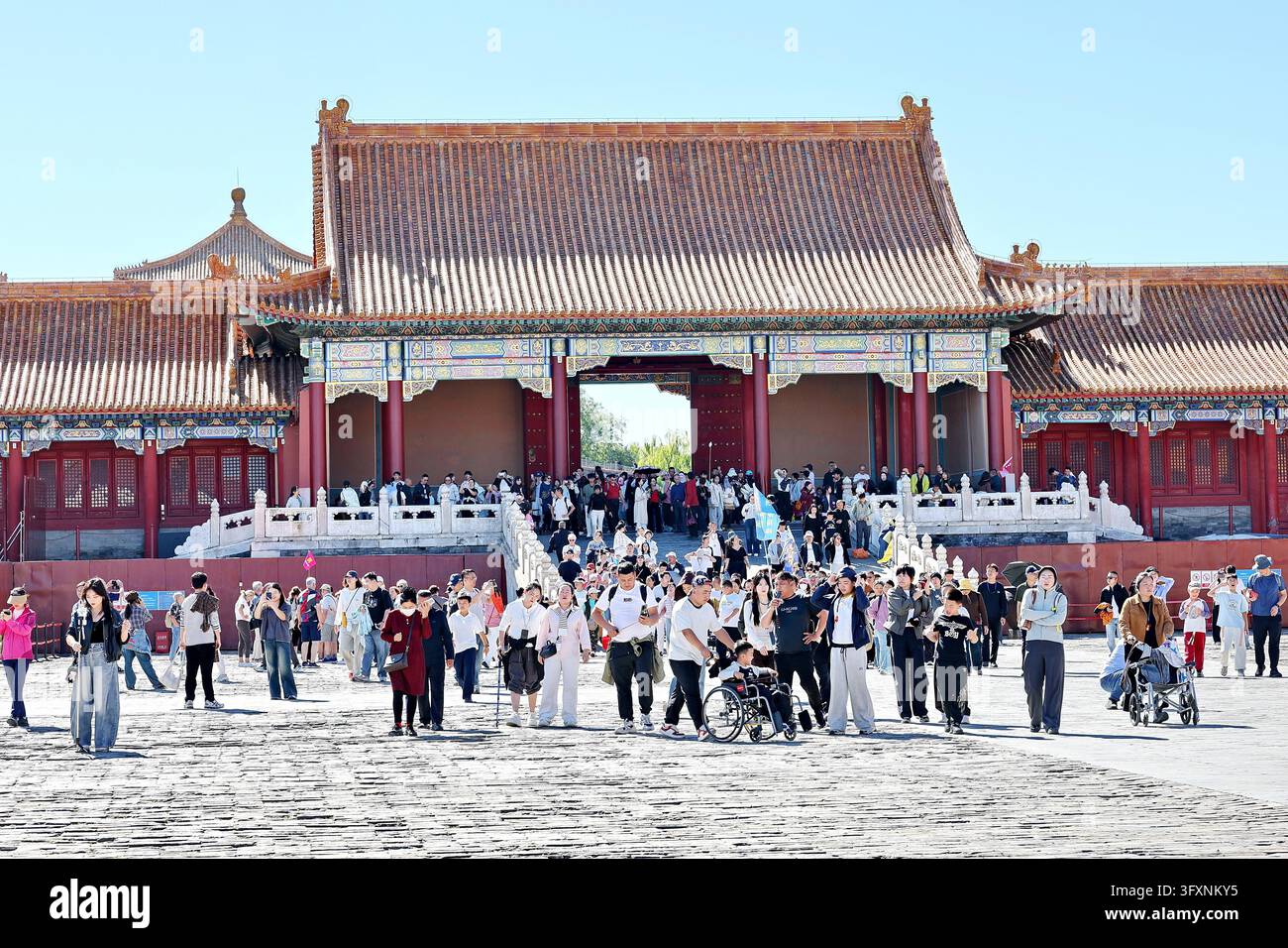 Visitors throng the Palace Museum in Beijing on October 6, 2026, as the ...