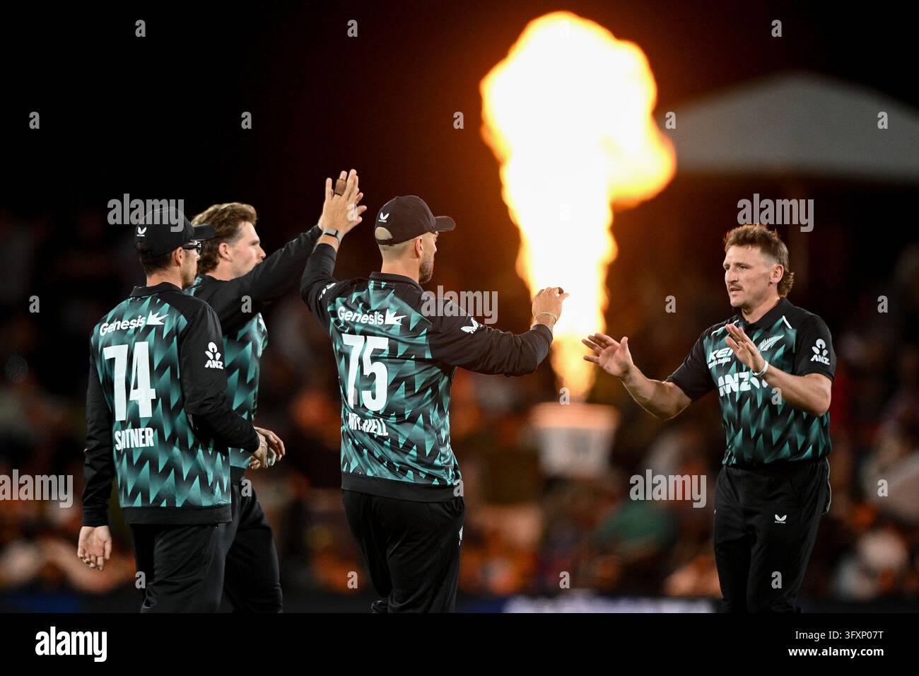 Wikets Vector New Zealand's Nathan Smith, right, celebrates with teammates the wicket ...