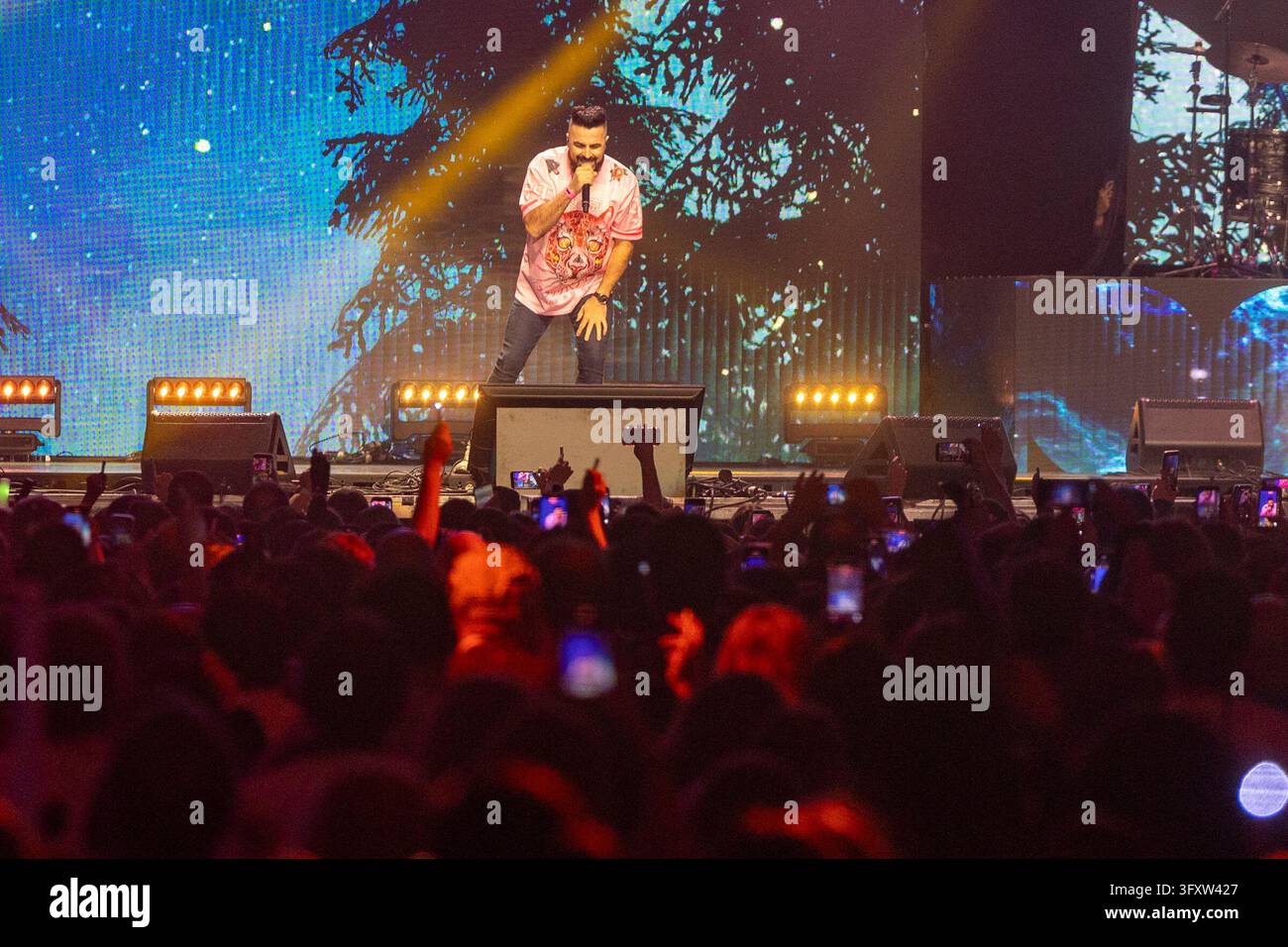 The singer Huecco during his performance at the Cadena 100 charity ...