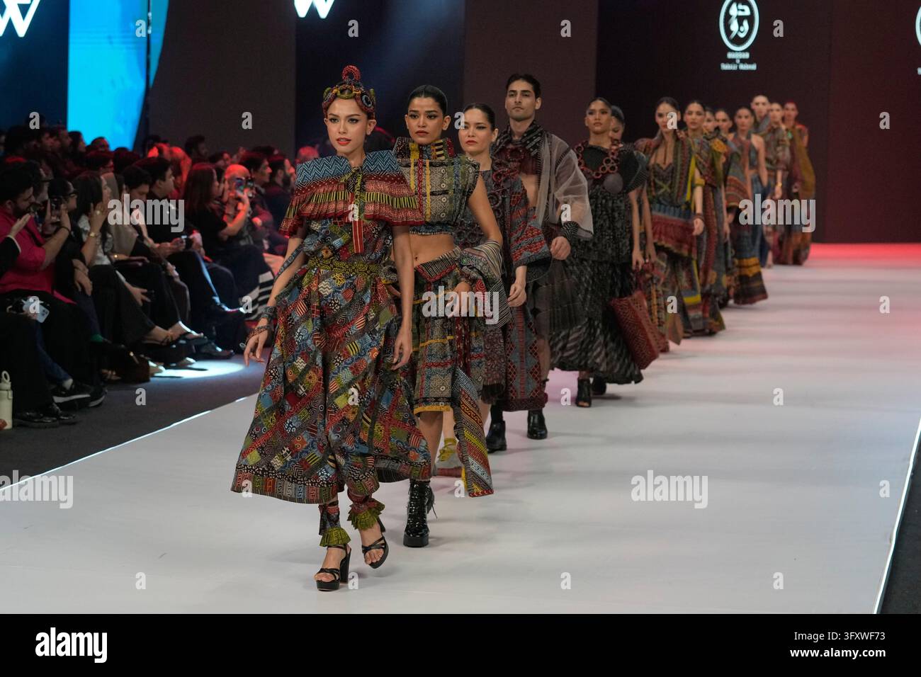 A models presents a creation by designer Yahsir Waheed during Laam ...