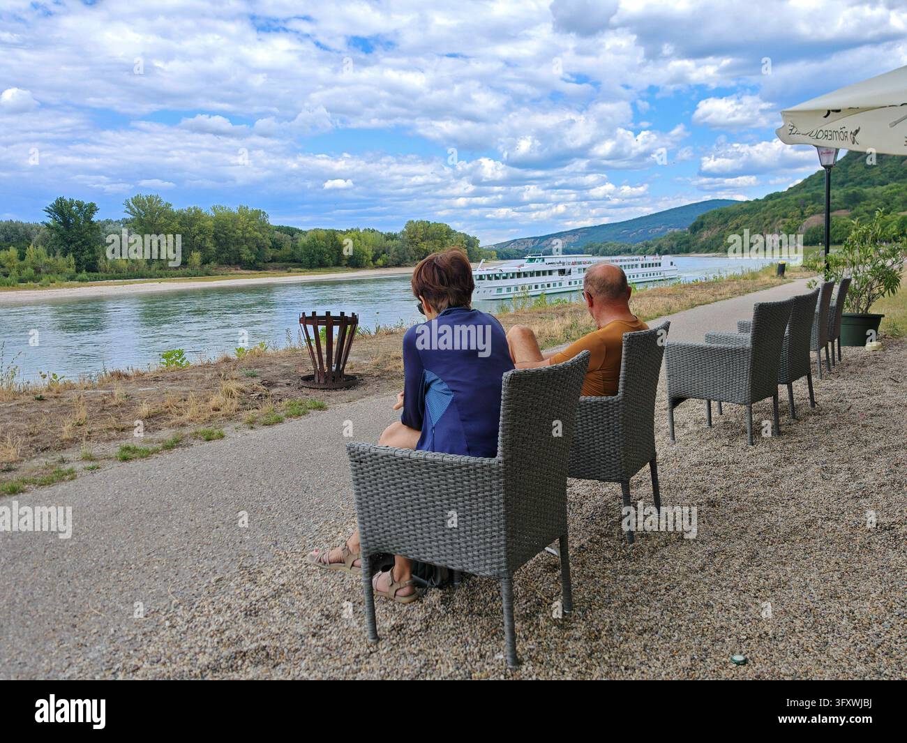 relaxing by the water, enjoying a hot summer day enjoy and relaxing by ...