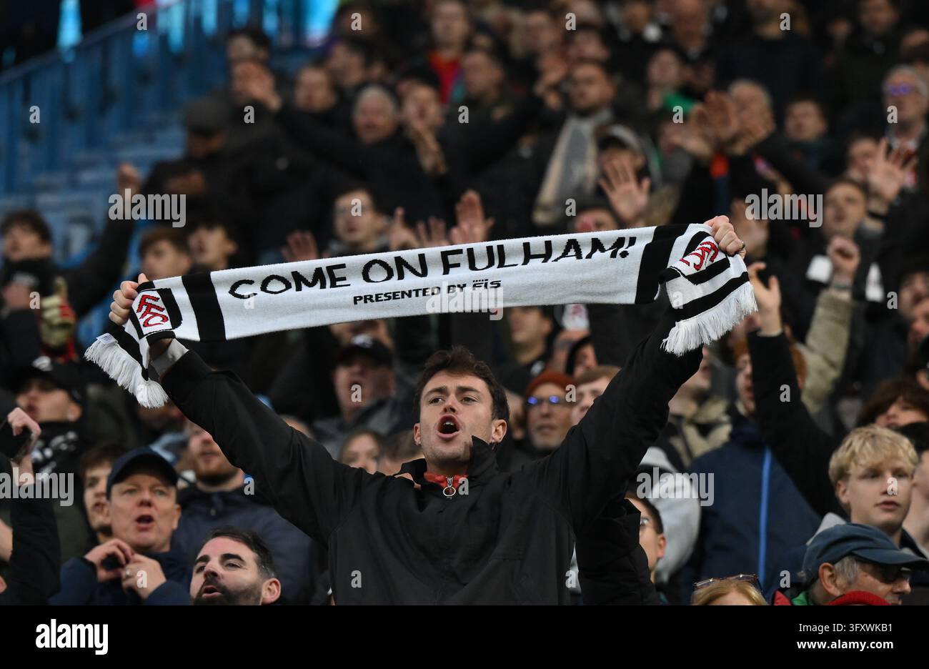Fulham fans celebrate the win during the Premier League match between ...