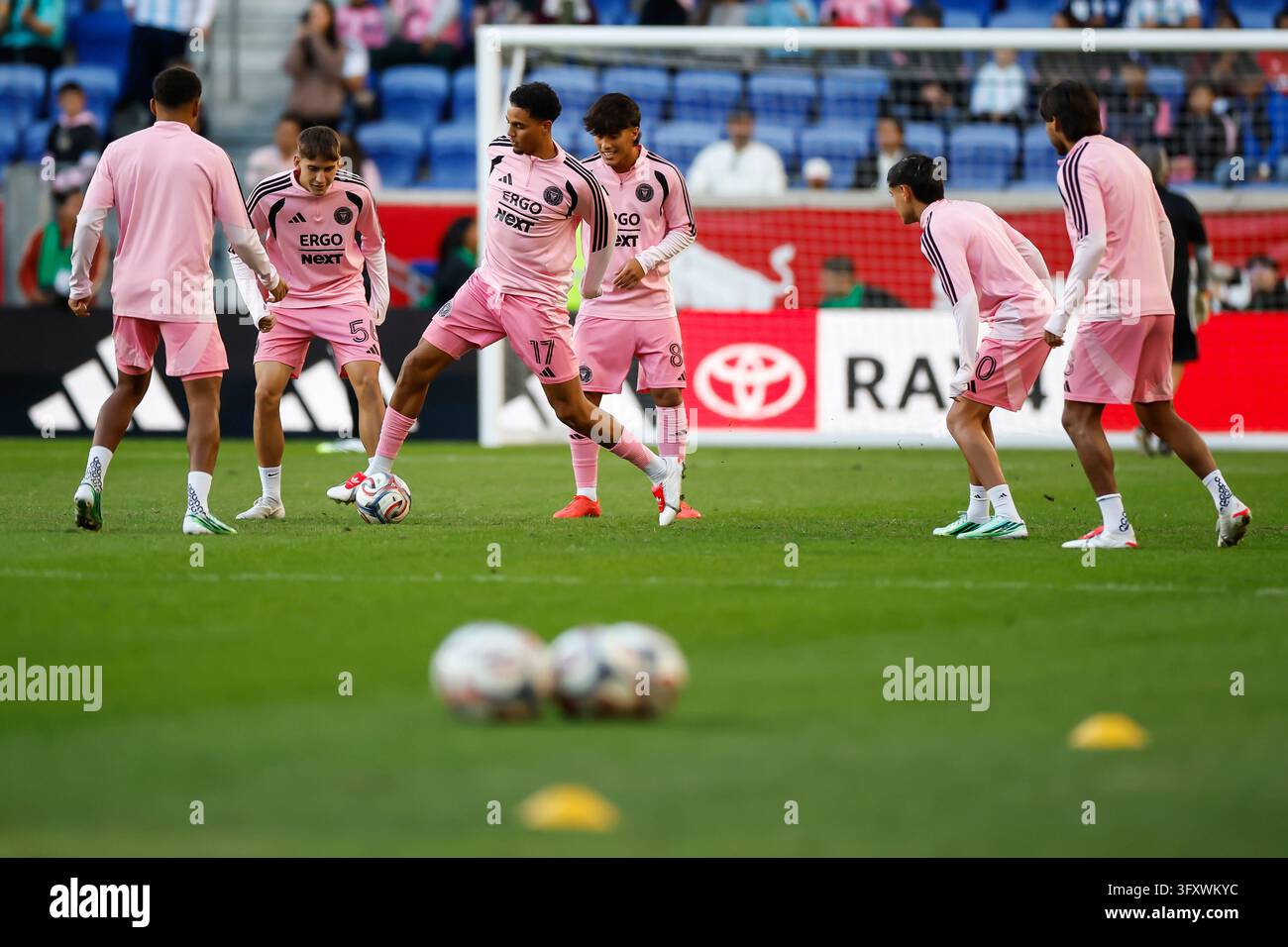 Red Before Vector Inter Miami players warm up before an MLS soccer match against the New ...