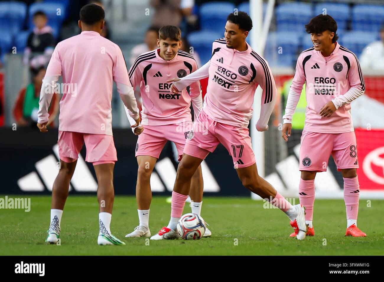 Red Before Vector Inter Miami players warm up before an MLS soccer match against the New ...