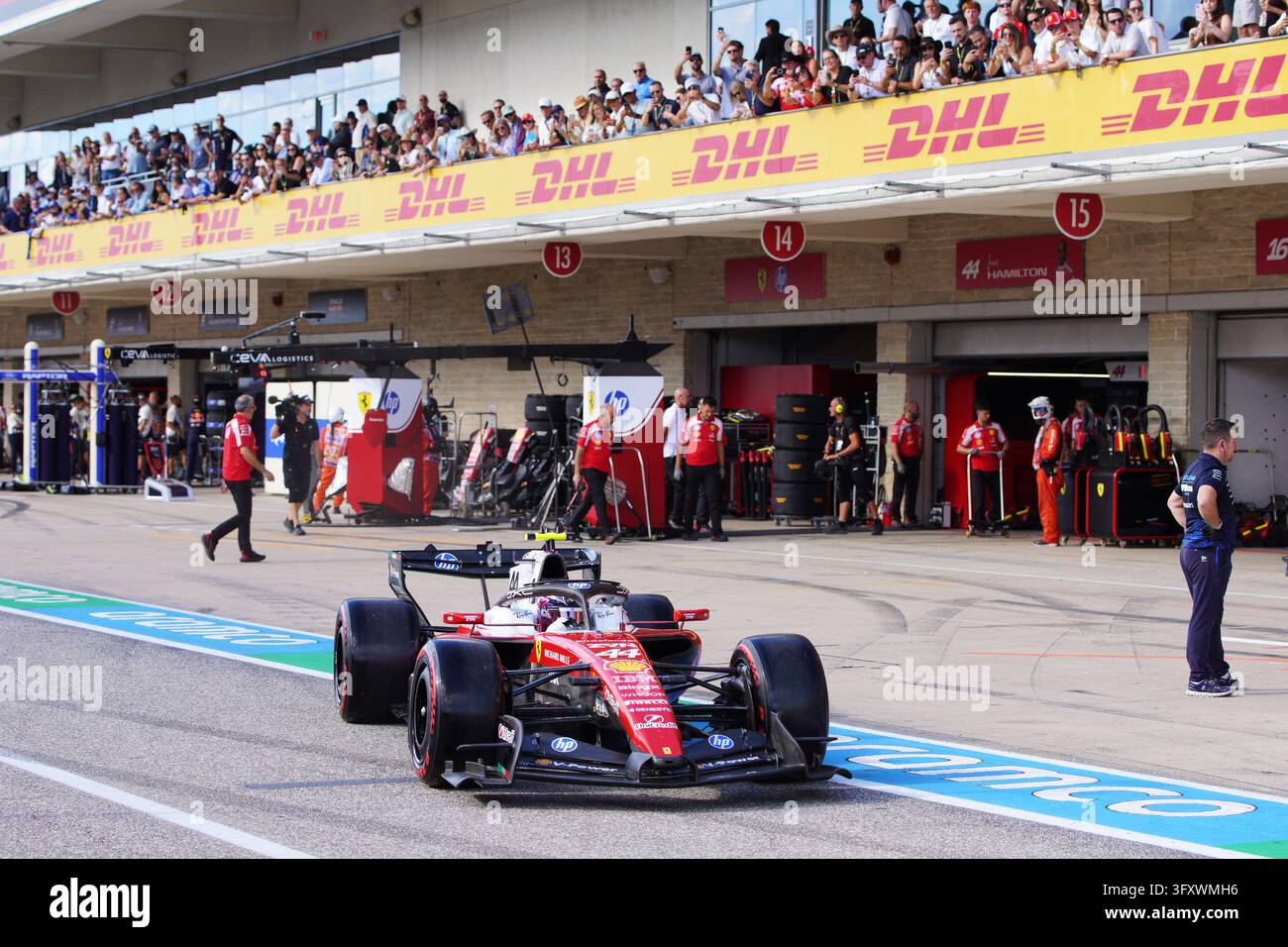 Pool Lane Size Ferrari driver Lewis Hamilton of Britain leaves pit lane during ...