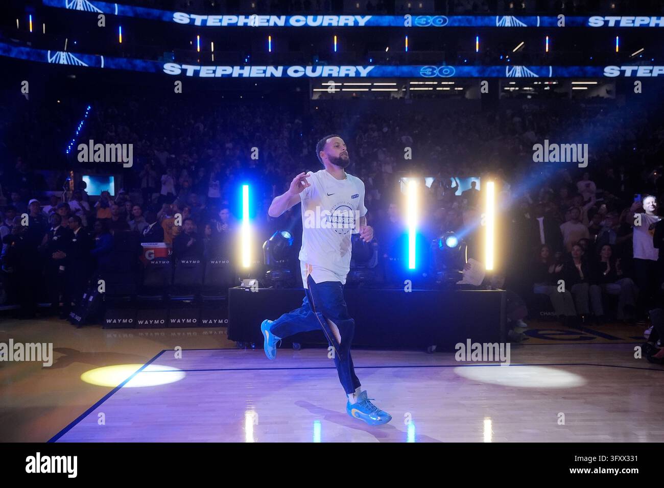 Stephin Model Golden State Warriors guard Stephen Curry is introduced before an NBA ...