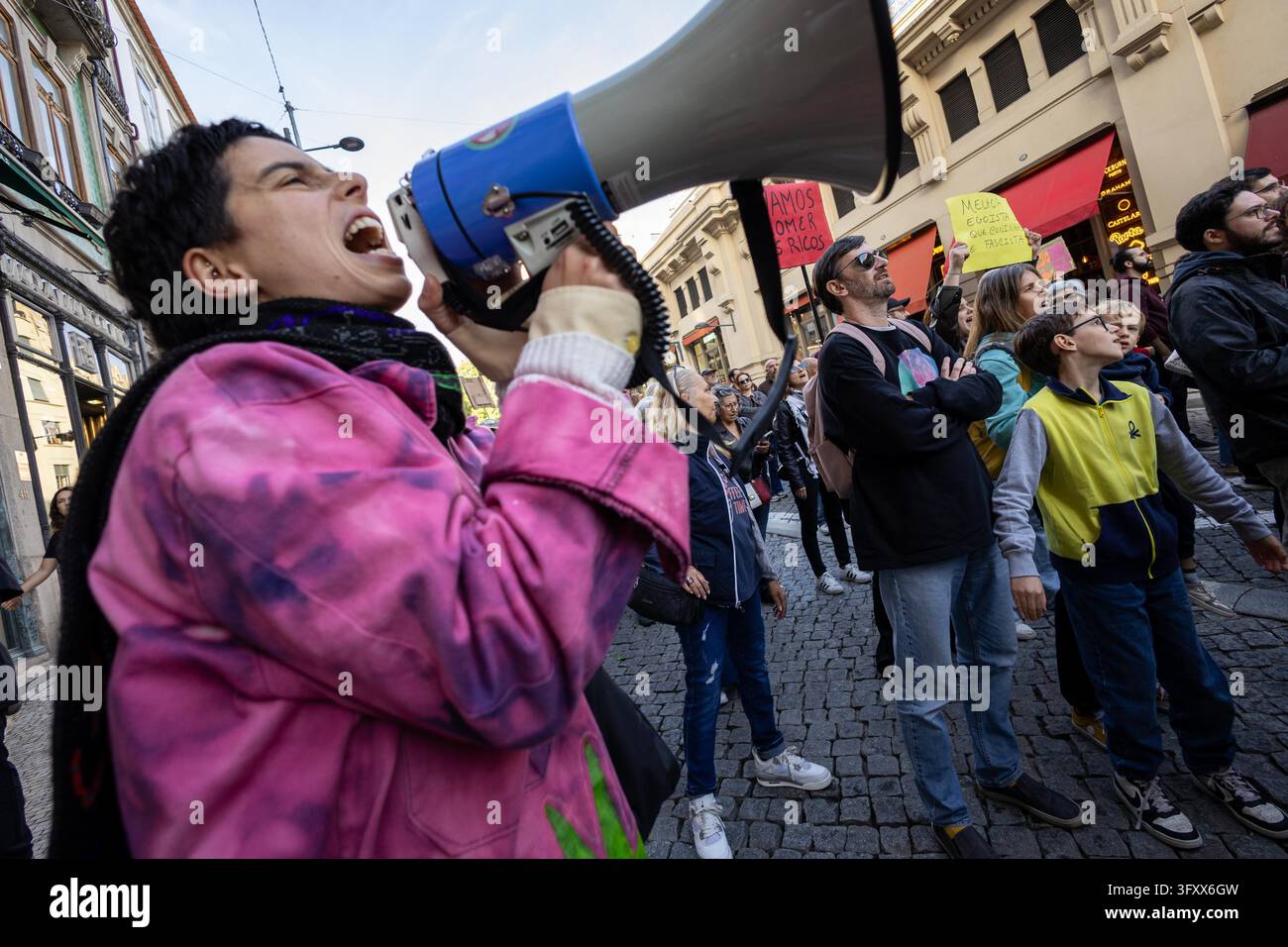 Demonstrator chants slogans through a megaphone during a nationwide ...