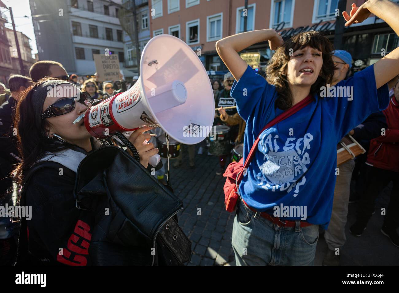 Porto, Portugal. 24th Oct, 2026. Demonstrator chants slogans through a ...