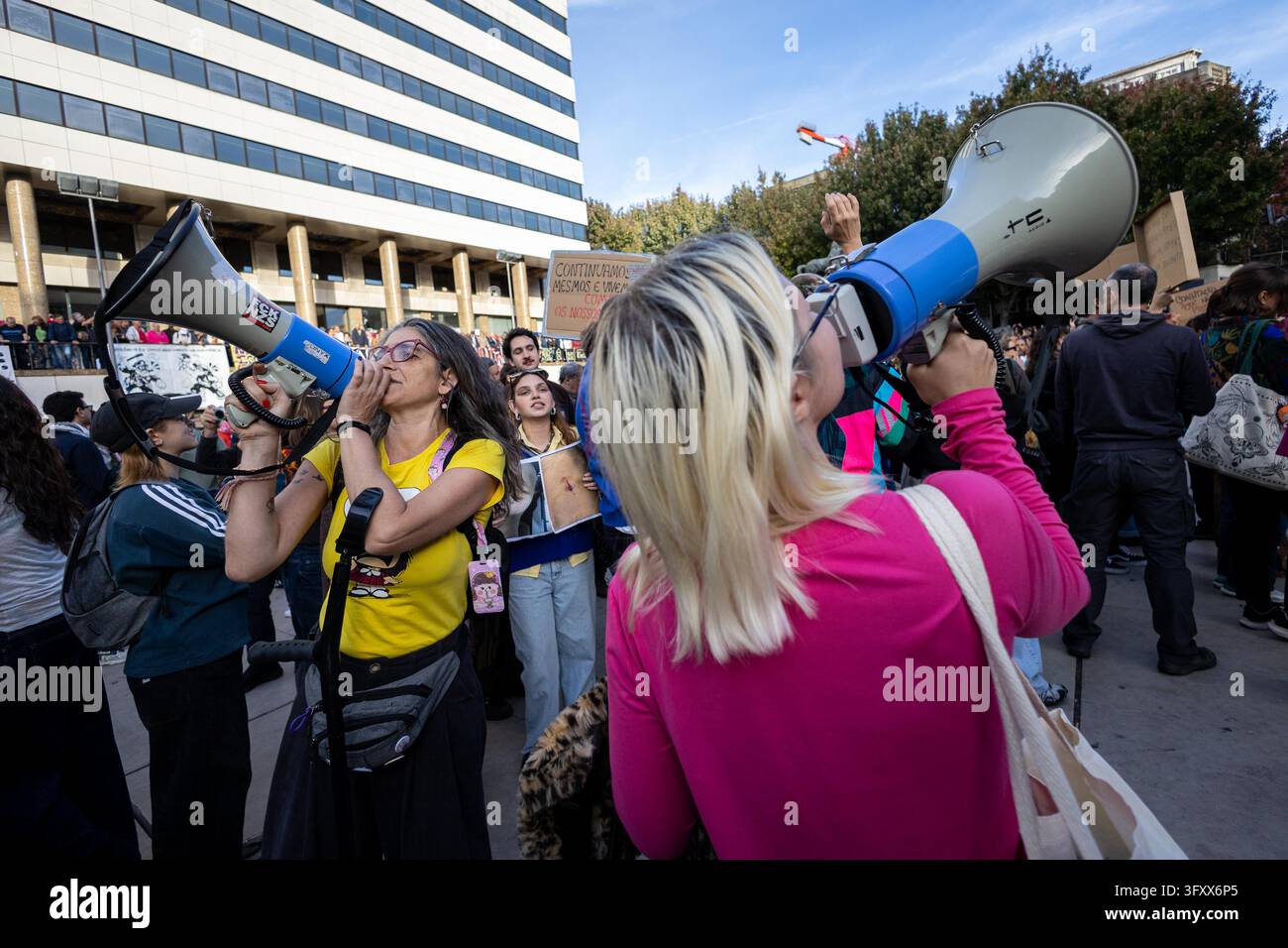 Demonstrators chant slogans through the megaphone during a nationwide ...