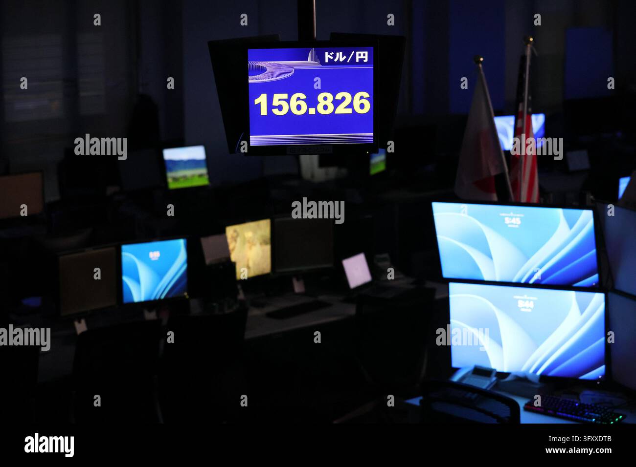 An electronic board displays the Japanese yen's exchange rate against ...