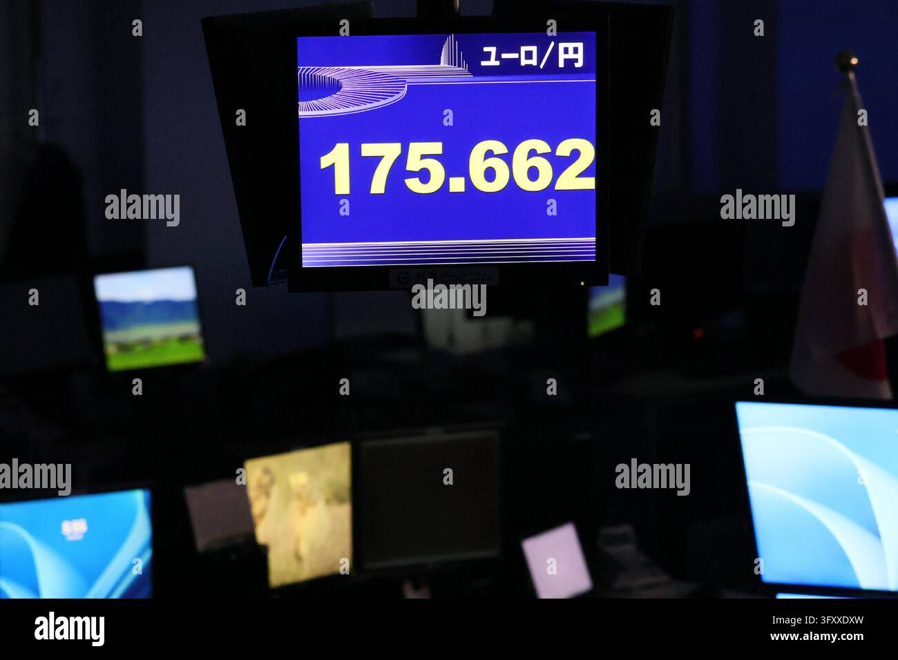 An electronic board displays the Japanese yen's exchange rate against ...