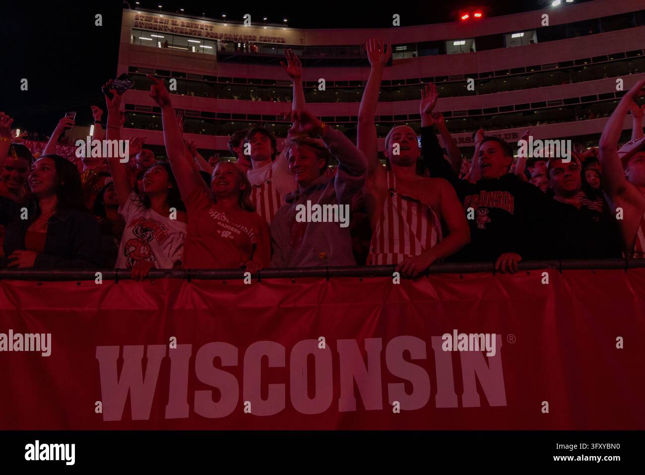 MADISON, WI - OCTOBER 24: University of Wisconsin-Madison students jump ...