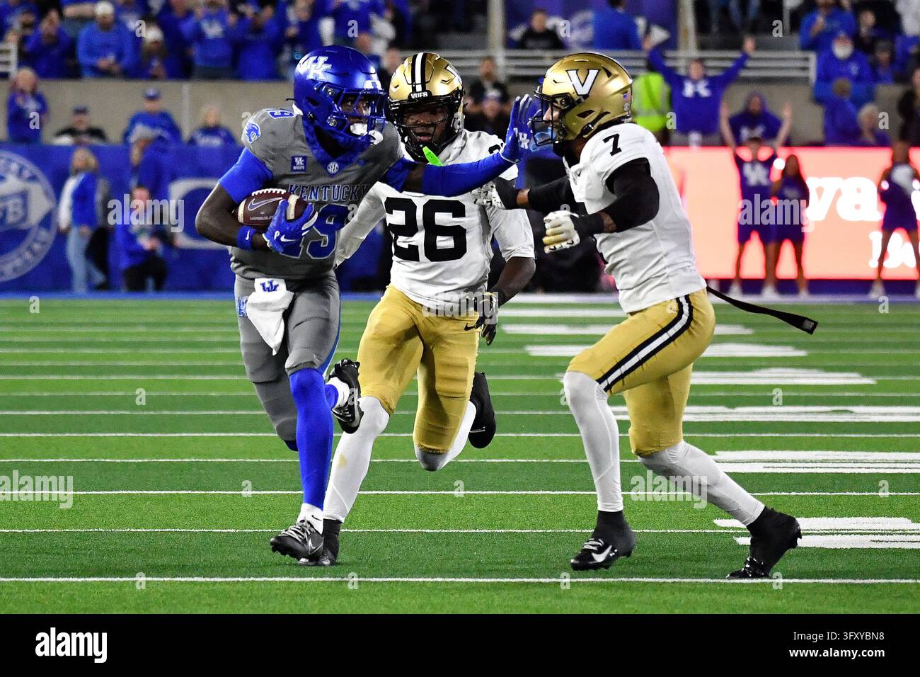 Kentucky wide receiver Kenny Darby (19) strong-arms Vanderbilt safety ...