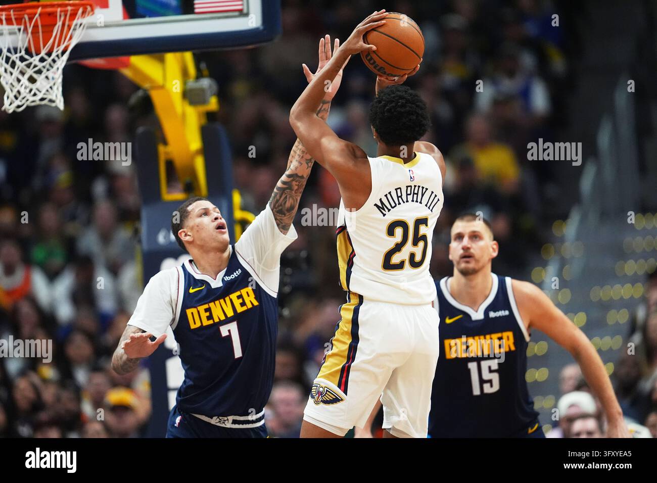 New Orleans Pelicans forward Trey Murphy III, center, goes up for a ...