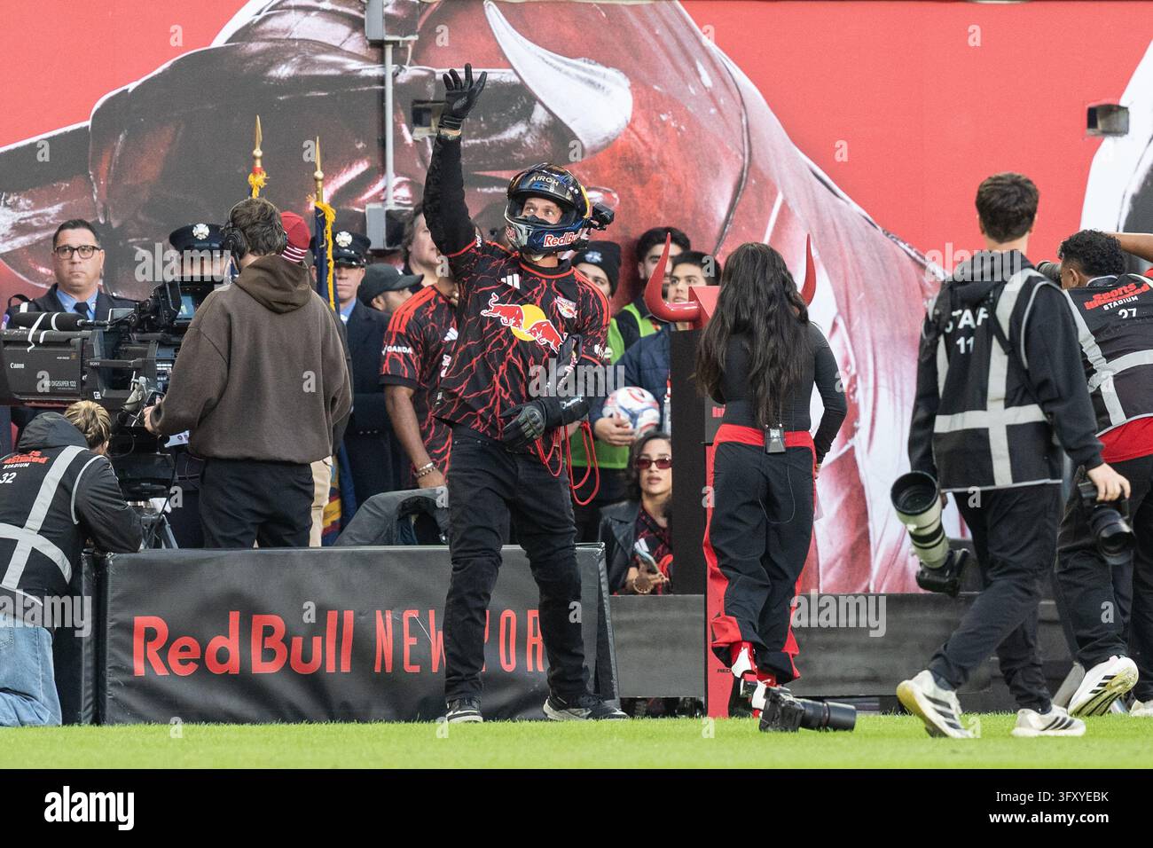 Red Before Vector Aaron Colton delivers on motorcycle game ball before MLS regular season ...