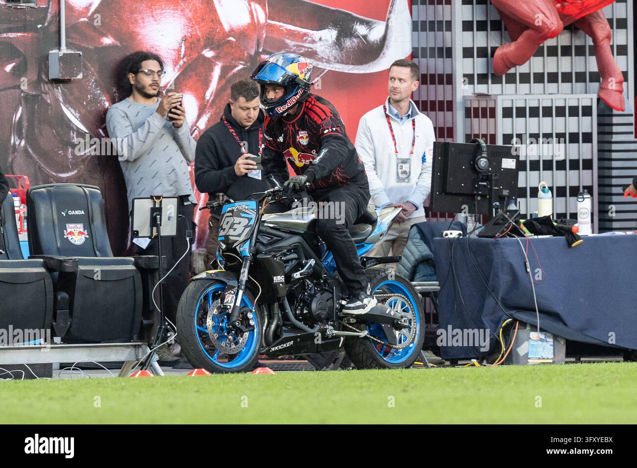Red Before Vector Aaron Colton delivers on motorcycle game ball before MLS regular season ...