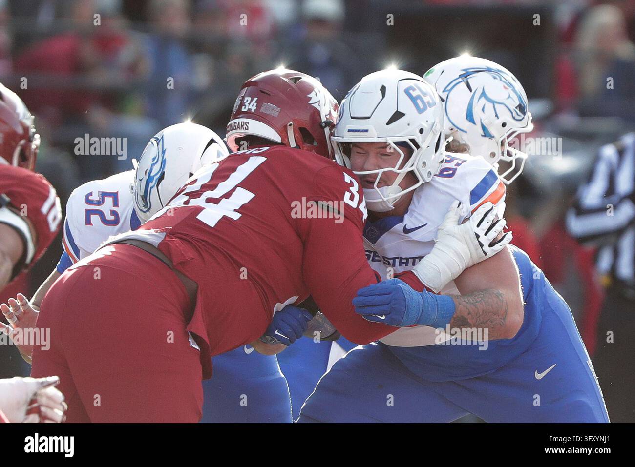 Football Block Image Vector Boise State offensive lineman Zander Esty (69) blocks Washington State ...