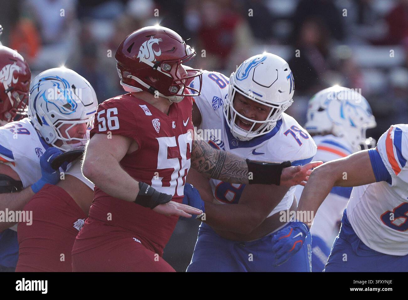 Football Block Image Vector Boise State offensive lineman Tyler Ethridge (78) blocks Washington ...